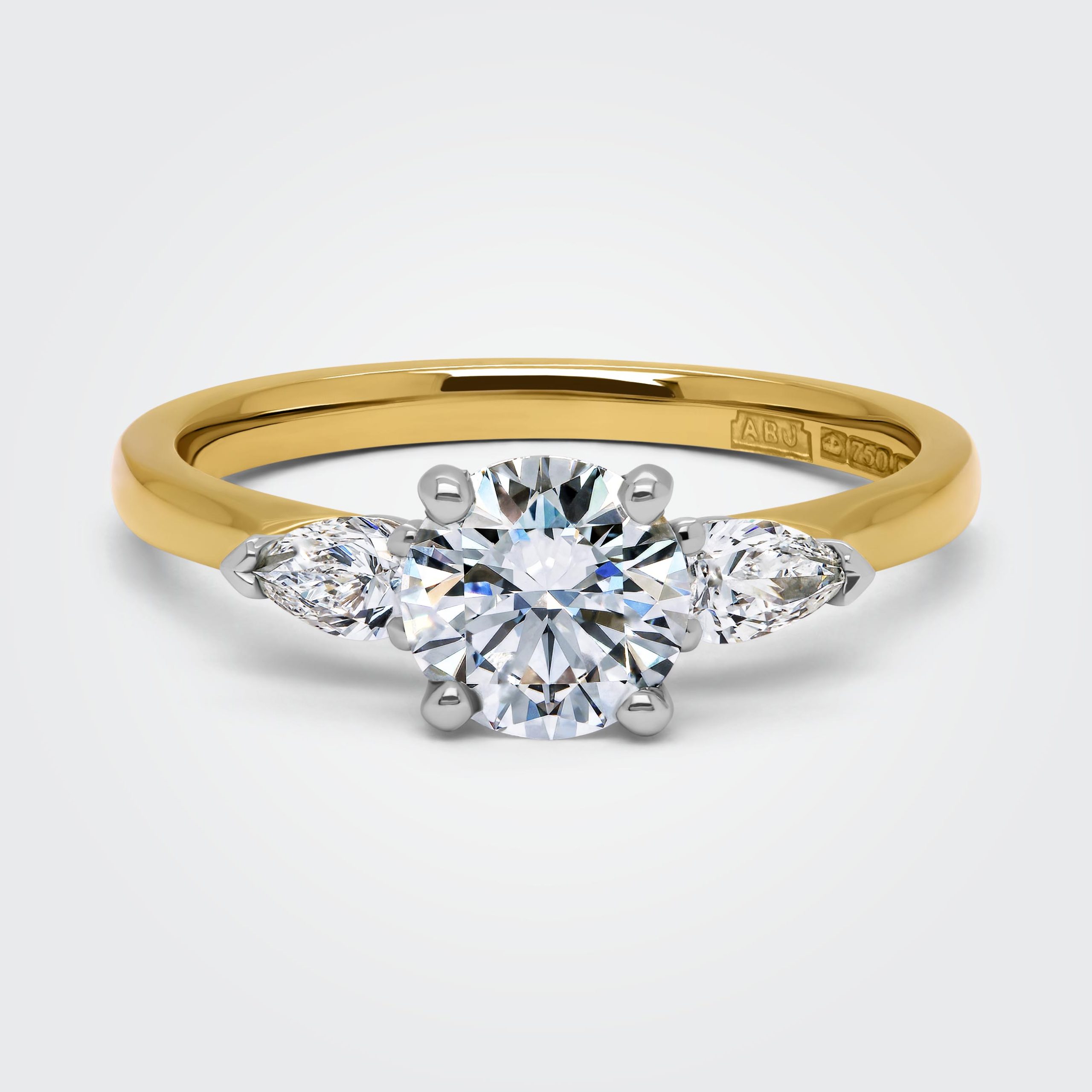 Elsa Brilliant Round Cut Diamond Trilogy Pear Engagement Ring